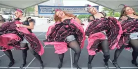  ?? MIKE DE SISTI / MILWAUKEE JOURNAL SENTINEL ?? Dancers with Madame Gigi's Outrageous French Cancan Dancers perform at the festival in 2017. They will perform several times a day at this year’s event.