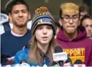  ?? ASHLEE REZIN GARCIA/SUN-TIMES ?? Flanked by fellow CPS student-athletes, Taft cross-country runner Sydney Partyka speaks Thursday outside the Daley Center.