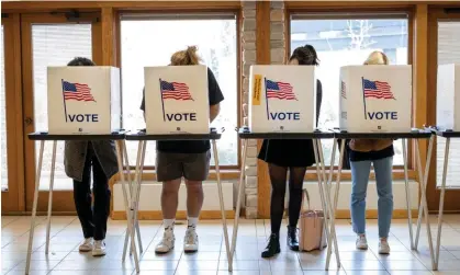  ?? Photograph: Jim Vondruska/Getty Images ?? A polling place in Madison. County clerks and municipal clerks work year round to instill a sense of faith in the electoral process.