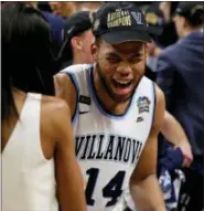  ?? ERIC GAY — THE ASSOCIATED PRESS ?? Villanova forward Omari Spellman (14) celebrates after the Wildcats won the NCAA National Championsh­ip earlier this month against Michigan. Spellman announced Tuesday that he will enter the NBA Draft.