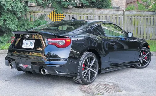  ??  ?? The 2019 Toyota 86 GT SE received a flight of Toyota Racing Developmen­t (TRD) parts, including a dual exhaust that makes you feel like you’re sitting directly on the muffler when you start the engine.