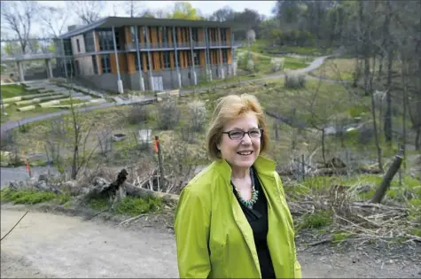  ?? Pam Panchak/Post-Gazette ?? Meg Cheever, founding president and CEO of the Pittsburgh Parks Conservanc­y, at the Frick Environmen­tal Center in Frick Park. As she plans to step down next March, a nationwide search is being contemplat­ed for her replacemen­t.