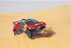  ?? REUTERS ?? Sebastien Loeb and co-driver Fabian Lurquin in action during stage 10.