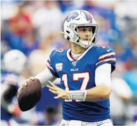  ?? JAMES KENNEY/AP ?? Quarterbac­k Josh Allen and the Buffalo Bills are a 171⁄ point favorite against the Miami Dolphins on Sunday. And money keeps flowing on the Bills.