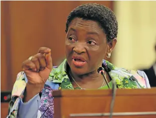  ?? /Ruvan Boshoff ?? Under fire: Social Developmen­t Minister Bathabile Dlamini answers questions in Parliament on Tuesday.