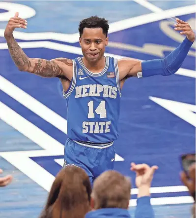  ?? CHRISTINE TANNOUS /THE COMMERCIAL APPEAL ?? Memphis’ Tyler Harris celebrates after the Tigers beat Cincinnati 87-80 on Jan. 9 at Fedexforum.