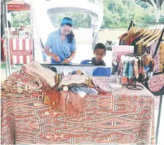  ??  ?? A stall selling Pua Kumbu, an iconic woven fabric of the Ibans in Kapit.