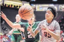  ?? ROBERTO E. ROSALES/JOURNAL ?? UNM’s Madi Washington, right, looks to handle a pass under the basket while being defended by Colorado State’s Myanne Hamm. Washington had 15 points in the Lobos’ 70-58 victory.