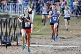  ?? Jason Fochtman / Staff photograph­er ?? Natasja Beijen of TheWoodlan­ds finished 10th with a time of 18 minutes, 13.5 seconds to lead the team’s third-place finish in the Class 6A race at the UIL State Cross Country Championsh­ips at Old Settlers Park in Round Rock on Tuesday.