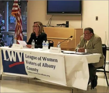  ?? NICHOLAS BUONANNO — NBUONANNO@TROYRECORD.COM ?? Two Watervliet City Council candidates participat­e in a forum Monday night. From left, former Councilwom­an Ellen Fogarty and current Councilman Charles Patricelli.