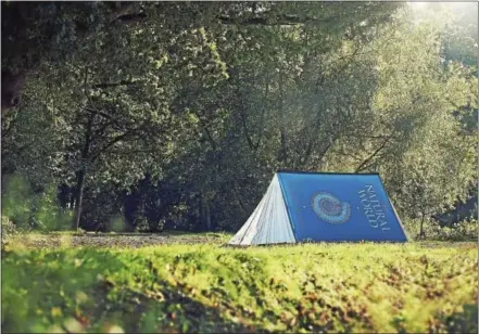  ?? WWW.FIELDCANDY.COM VIA AP ?? This undated photo provided by the U.K.-based company Field Candy shows their open book themed tent design. The company is known for its interestin­g and unusual tent designs.