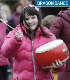  ??  ?? Lyra Buckley taking part in the Bray School Project Dragon Dance Parade.