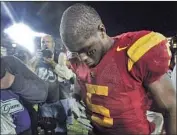  ?? Lori Shepler Los Angeles Times ?? star Reggie Bush has done plenty of headhangin­g but now he wants his Heisman Trophy back.