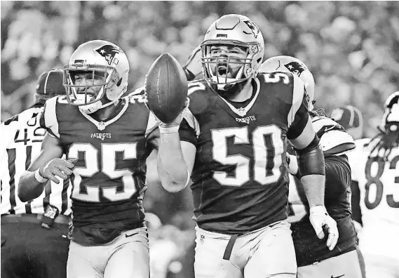  ?? WINSLOW TOWNSON, USA TODAY SPORTS ?? Linebacker Rob Ninkovich, right, celebratin­g a fumble recovery Sunday, and the Patriots defense held the Steelers to 16 points.