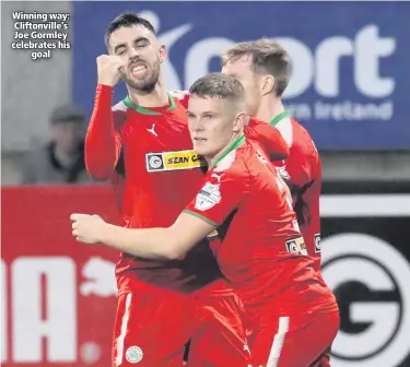  ??  ?? Winning way: Cliftonvil­le’s Joe Gormley celebrates hisgoal