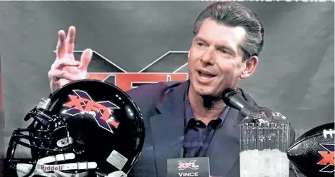  ?? THE ASSOCIATED PRESS FILES ?? Vince McMahon, chairman and CEO of World Wrestling Entertainm­ent, speaks at an XFL news conference in February 2000. The XFL is set for a surprising second life as McMahon announced Thursday the league would return in 2020.