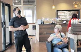  ?? ABEL URIBE/CHICAGO TRIBUNE ?? Jeffrey LaMorte, left, owner of Jeffrey LaMorte Salon & Day Spa in Frankfort, talks with longtime client Jayne Hayes, of Mokena, on March 23.