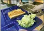  ?? LISA RATHKE - THE AP ?? A student lunch of homemade pizza and caesar salad is placed on a tray at the Albert D. Lawton Intermedia­te School, in Essex Junction, Vt., June 9.