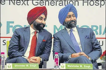  ?? MINT/FILE ?? IHH Healthcare will buy 26% stake in Fortis from Shivinder (left) and Malvinder Singh