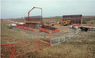  ?? PHIL MARSH ?? Aggregates is a growing area for rail freight, fuelled by projects such as East West Rail and HS2. This is the bridge being built near Calvert that will take EWR over HS2, as seen on March 3.