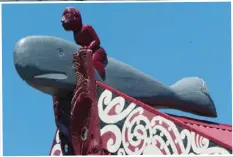  ??  ?? Top, whale watching near Kaikoura. Below, a carving of Paikea the whale rider on the Whitireia meeting house at Whangara Marae, north of Gisborne.