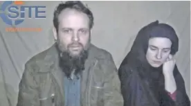  ??  ?? This undated militant file image from video posted online in August 2016, which has not been independen­tly verified by The Associated Press, provided by SITE Intel Group, shows Canadian Joshua Boyle and American Caitlan Coleman, who were kidnapped in...