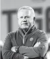  ?? GERALD HERBERT/AP ?? LSU head coach Brian Kelly watches players during LSU Pro Day on Wednesday in Baton Rouge, Louisiana.