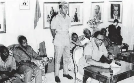  ??  ?? Supreme Military Council - (Seated in front) Major -General J.T.U. Aguiyi-Ironsi (Supreme Commander/Head of State). (Seated behind L-R) Major Hassan Usman Katsina (Governor Northern Region), Colonel Chukwuemek­a Odumegwu Ojukwu (Governor Eastern...