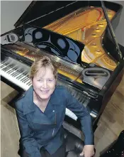  ??  ?? At relocated Tom Lee Music, Jane Coop saw a $600,000 Steinway she may play to launch her cross-Canada, New York and London recital tour.