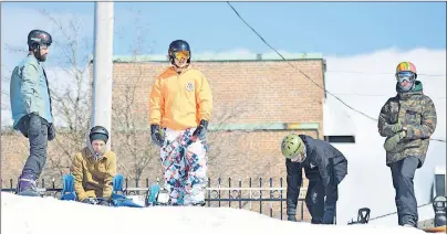  ?? CAPE BRETON POST PHOTO ?? The first five competitor­s in the open category for those 15 and older prepare for their first preliminar­y runs down the slope at the White Out Urban snowboardi­ng competitio­n on the Sydney waterfront last March. A snowboard competitio­n will be a part...