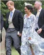  ??  ?? Hit and miss: Meghan’s yellow outfit (left) and ‘duvet cover’ dress (above)