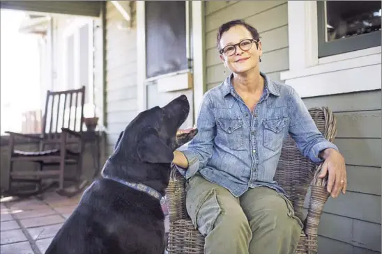  ?? Katie Falkenberg Los Angeles Times ?? DIANA WAGMAN, at home in Echo Park with Henry, 30 years ago survived being lost at sea. “I really started to look at what that had to do with who I am,” she says.