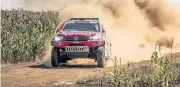  ??  ?? Leeroy Poulter takes the win in the Toyota Hilux.