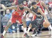  ?? DAVID J. PHILLIP— ASSOCIATED PRESS ?? The Rockets’ James Harden, left, tries to steal the ball fromthe Spurs’ PattyMills on Monday night in Houston.