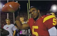  ?? THE ASSOCIATED PRESS — 2005 ?? Former USC tailback Reggie Bush has returned to the fold after years of being shunned due to NCAA violations.