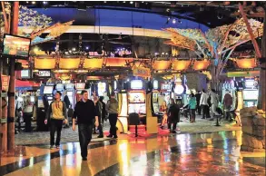  ?? Christian Abraham / Hearst Connecticu­t Media ?? Visitors at the Mohegan Sun Casino in Uncasville.