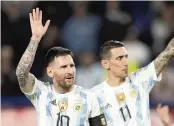  ?? NATACHA PISARENKO AP ?? Argentina — with Lionel Messi, left, and Angel Di Maria — is in Group C with Mexico, Poland and Saudi Arabia.