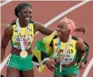  ?? GETTY IMAGES ?? Gold medallist Shericka Jackson, left, celebrates her gold medal in the women’s 200m with compatriot ShellyAnn Fraser-Pryce.