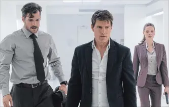  ?? CHIABELLA JAMES THE ASSOCIATED PRESS ?? Henry Cavill, Tom Cruise and Rebecca Ferguson in a scene from "Mission: Impossible —Fallout."