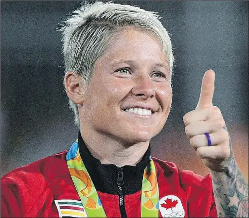  ?? SEAN KILPATRICK/THE CANADIAN PRESS ?? Canada’s captain Jen Kish gives a thumbs-up after winning the bronze-medal game against Great Britain in women’s rugby sevens at the 2016 Olympic Games in Rio de Janeiro. Kish is retiring, due to injuries.