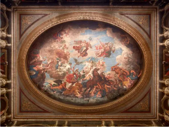  ?? ?? Fig 3 preceding pages: The battle plan of Blenheim being presented to Britannia. The oval was painted by Sir James Thornhill in 1716. Fig 4 above: The Apotheosis of the Duke on the Saloon ceiling, painted by Louis Laguerre in 1718. Fig 5 facing page: The Saloon is overlooked by figures representi­ng the four Continents and the marble doorcase is ornamented with an imperial eagle