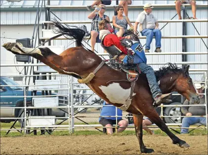  ?? STEVEN MAH/SOUTHWEST BOOSTER ?? Maple Creek’s Blake Link is pictured competing in Novice Bareback at the Kyle Community Rodeo on August 11.