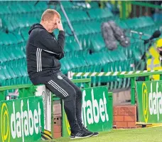  ??  ?? Neil Lennon during the Champions League loss to Ferencvaro­s