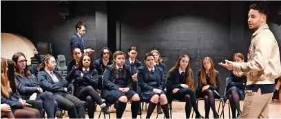  ?? ?? ●●Adam speaks to cast members of the school production of Bugsy Malone.