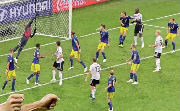  ?? AP ?? Sweden goalkeeper Robin Olsen fails to save a goal from Germany’s Toni Kroos as players of both teams look on during their Group ‘F’ match at the Fisht Stadium in Sochi on Saturday. —