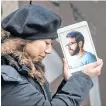  ?? POSTMEDIA NEWS ?? Maral Gorginpour stands out front of her Toronto home with a portrait of her husband who was killed when Ukraine Airlines Flight PS752 was shot down by the Iranian military days after they were married.