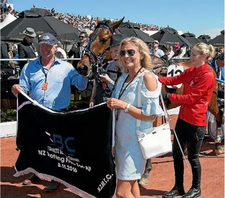  ?? JOESEPH JOHNSON ?? Trainers Greg and Nina Hope with Monbet after winning the Group 1 trott at Addington on Cup Day.