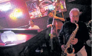  ?? Hyoung Chang, Denver Post file ?? In 2009, the late Freddy Rodriguez, right, performs with other musicians at El Chapultepe­c jazz bar in downtown Denver.