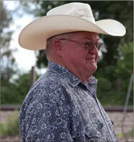  ??  ?? Tuffy Winberg is pictured above at the 2015 Free Pit BBQ at the Custer County Fair. Since the beginning, he was instrument­al in the BBQ. Winberg died July 1, 2017. Since his passing, the BBQ has taken his name in his honor.
Donnis Hueftle-Bullock