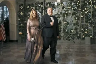  ?? Alex Brandon/Associated Press ?? CIA director Mike Pompeo and his wife Susan Pompeo arrive for a State Dinner with French President Emmanuel Macron and President Donald Trump at the White House on Tuesday in Washington. Mr. pompeo was sworn in Thursday as secretary of state.